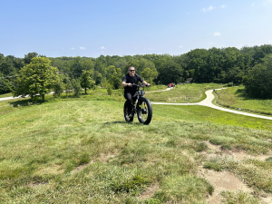Man riding electric bike on a hill